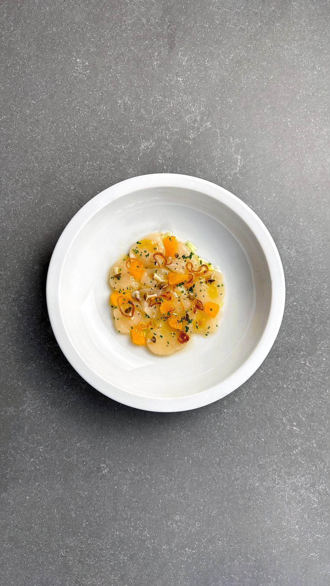 Scallop Crudo with Tonka Bean Brown Butter and Mandarin